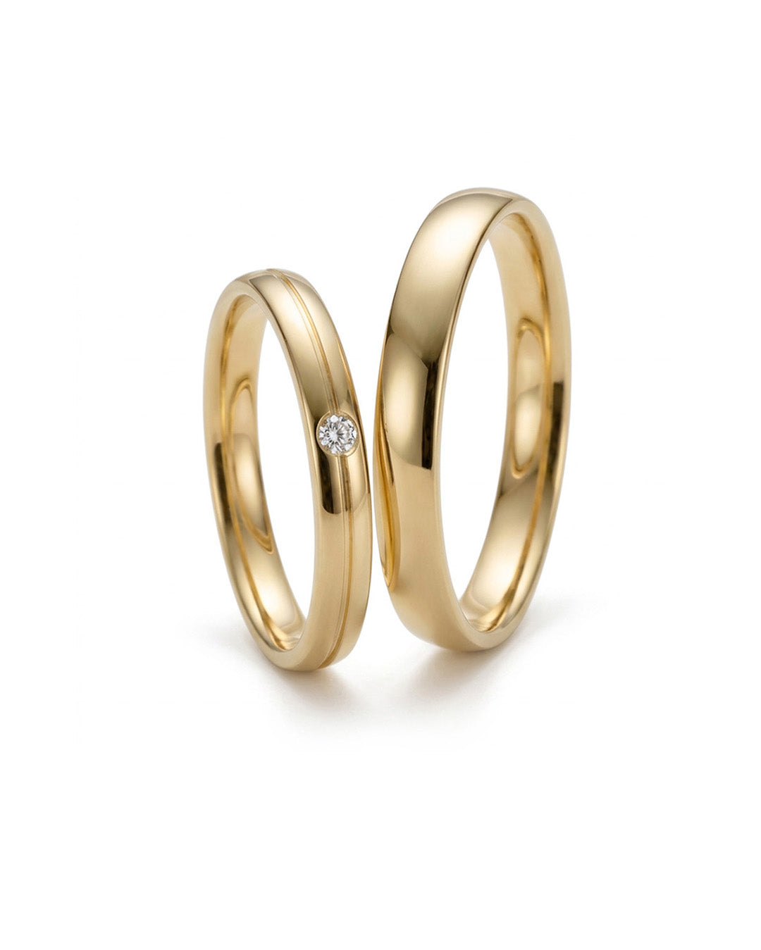 Klassische Trauringe/Eheringe in Gelbgold mit 0,015 ct. Brillant tw, vsi
