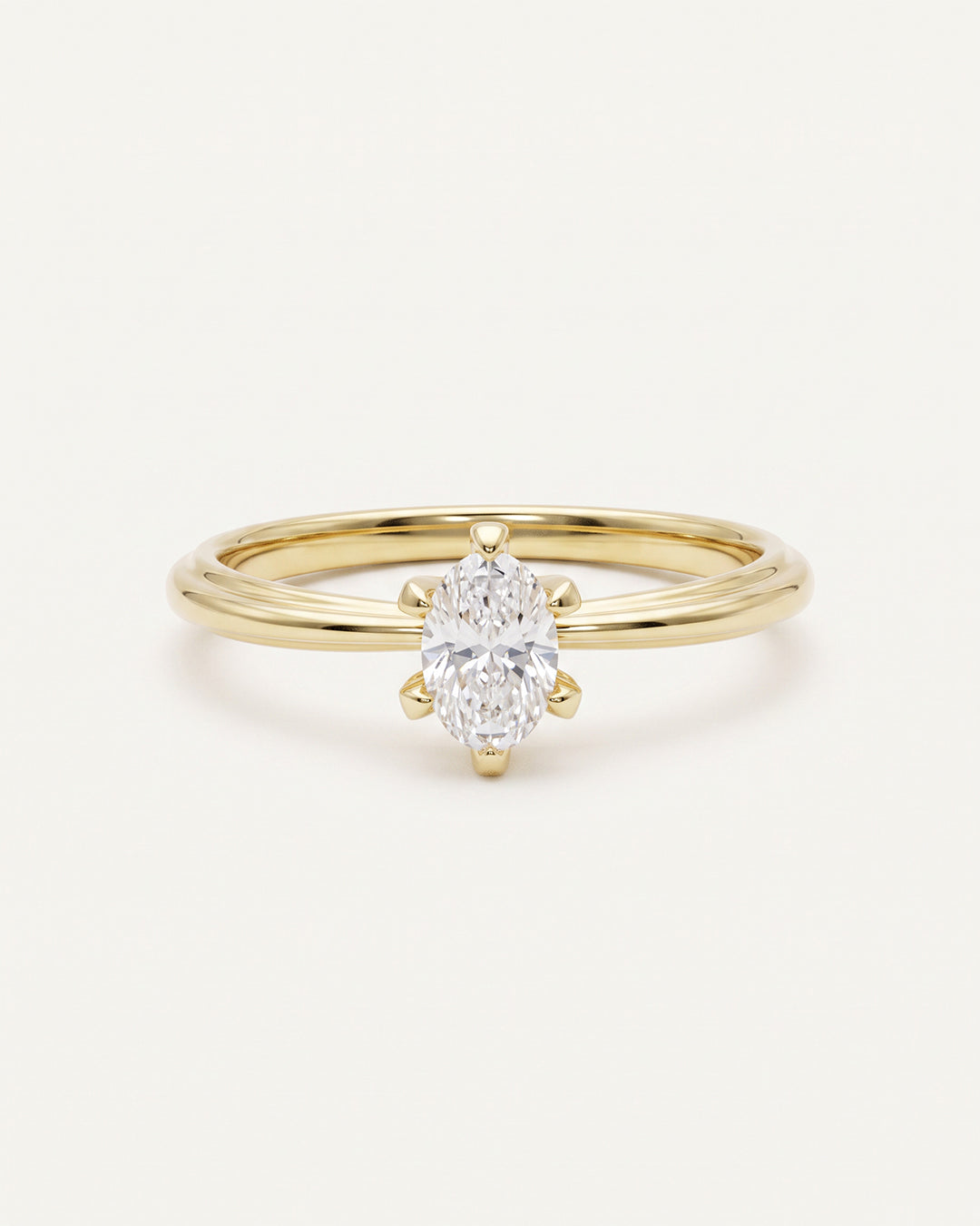 Verlobungsring in Gelbgold, Ringschiene mit kleiner Facette, Solitaerring mit ovalem Diamanten